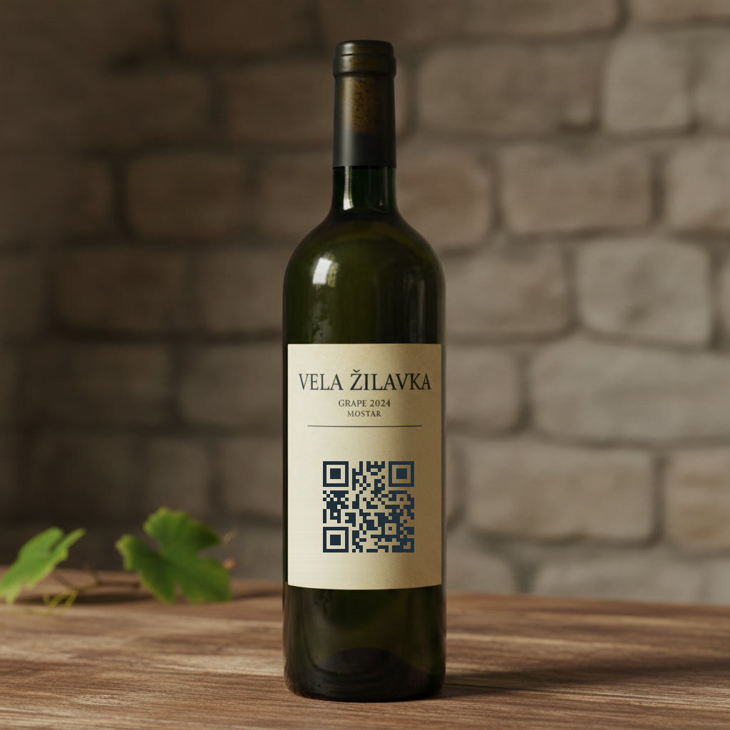 A green bottle with a paper label, a QR code printed on the label.